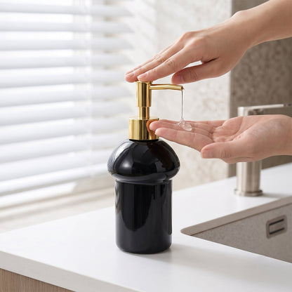 Kitchen and bathroom soap dispenser in black glass with gold pump